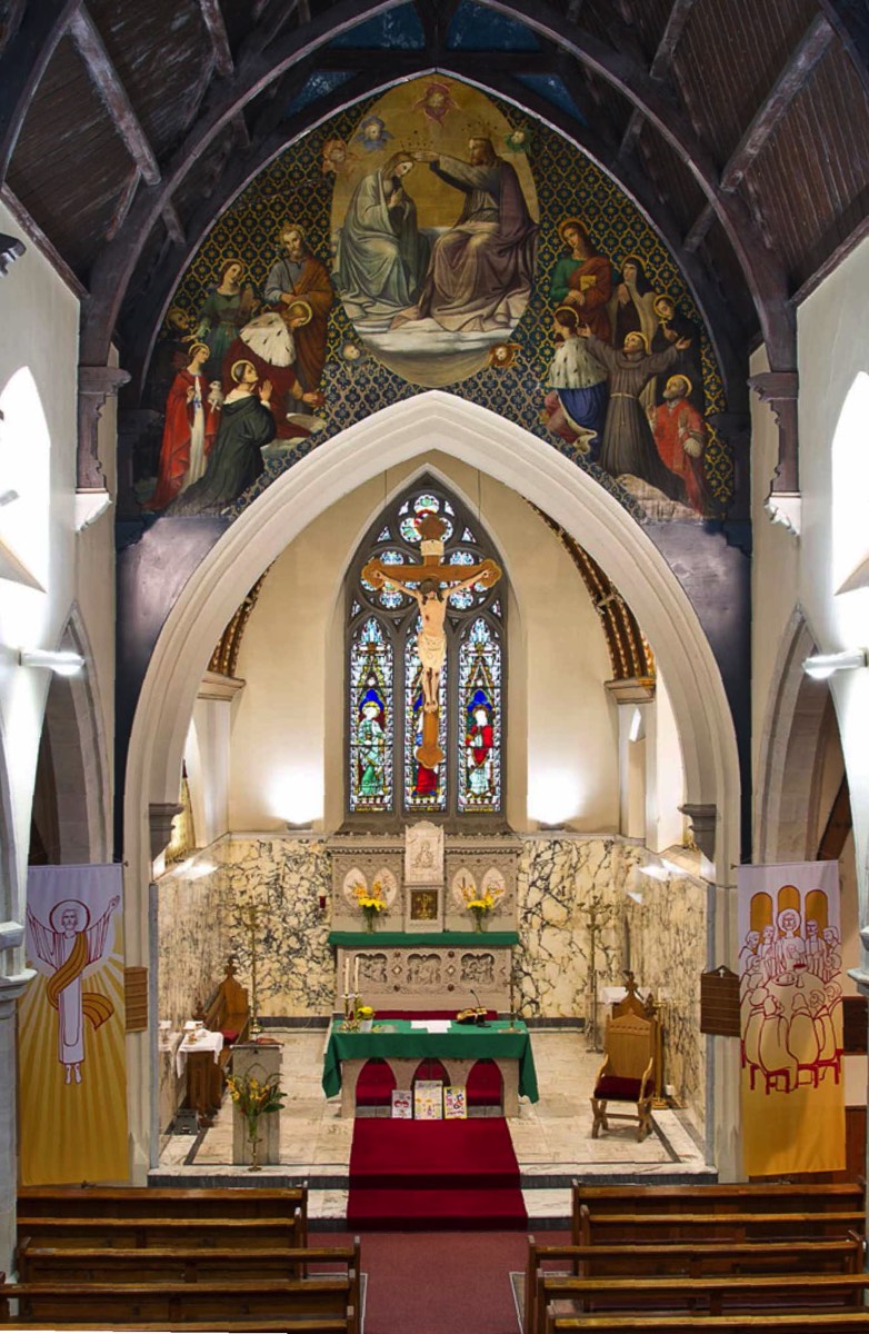 Altar, crucifix and mural
